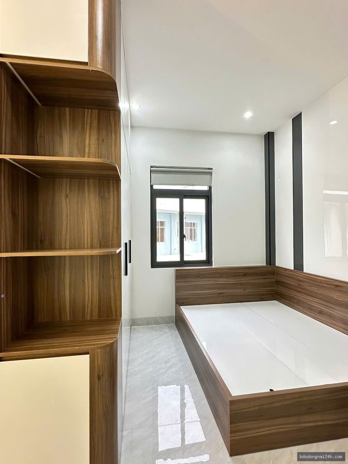 Bán nhà 1 trệt 2 lầu, sân ô tô, full nội thất tại Tân Triều - Hình ảnh 4